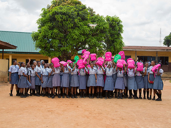 OVH team sponsors girls at Omole Senior Grammar school with school supplies.