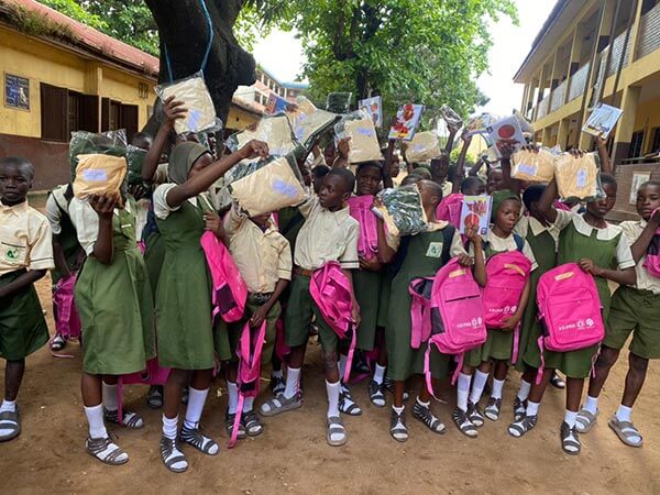 Distribution of school supplies at Ilupeju junior secondary school